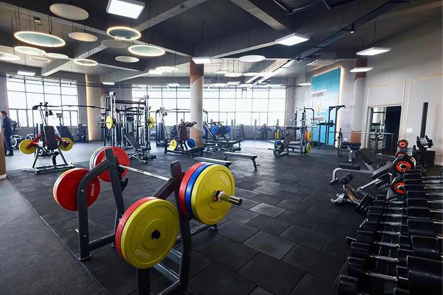 Pristine, well-lit fitness center maintained by Kootenay Fresh Cleaning
